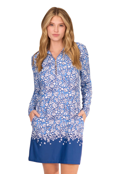 A blonde woman wearing the sun protective & turquoise Camden 1/4 Zip Sport Dress from Cabana Life on a white background.