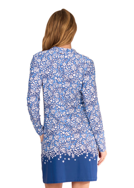 The back of a blonde woman wearing the sun protective & turquoise Camden 1/4 Zip Sport Dress from Cabana Life on a white background.